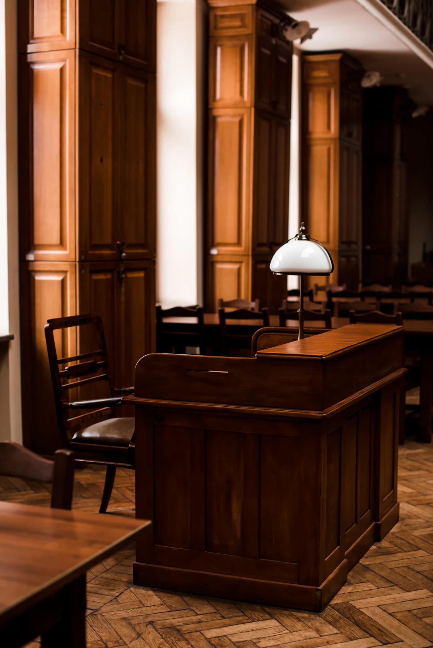 A wood-panelled courtroom interior, the setting where an appeal is heard.